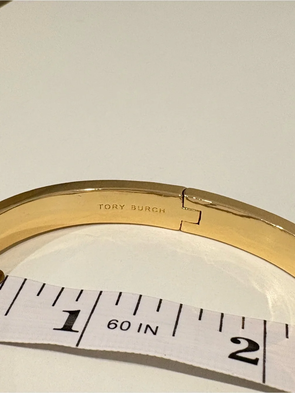 Tory Burch Black and Gold Logo Hinge Bangle